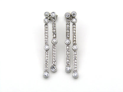 18K gold diamond drop earrings.