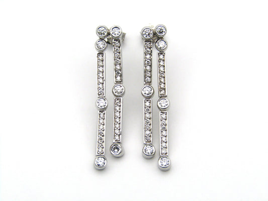18K gold diamond drop earrings.