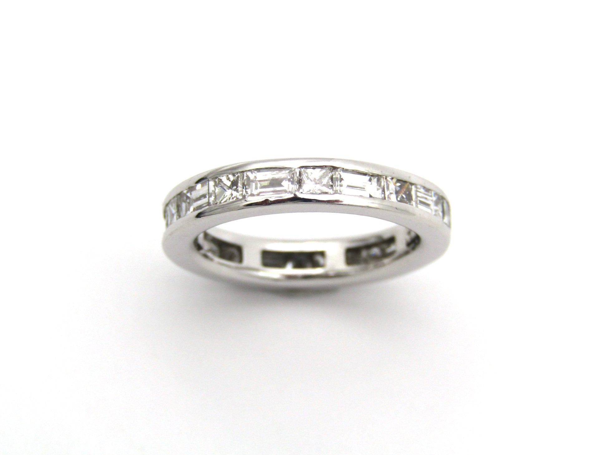 18K gold diamond eternity ring.