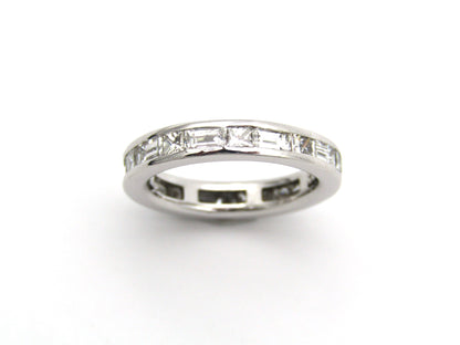 18K gold diamond eternity ring.