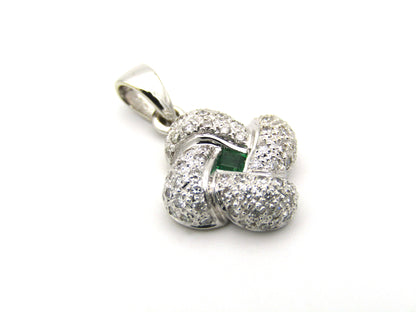 18K gold emerald and diamond pendant.