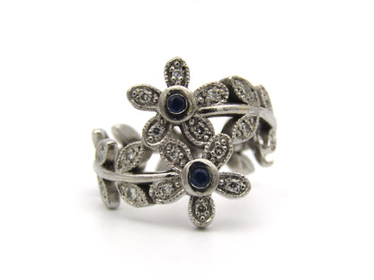 18K gold sapphire and diamond ring.
