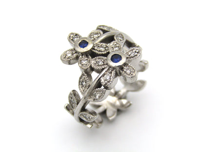 18K gold sapphire and diamond ring.
