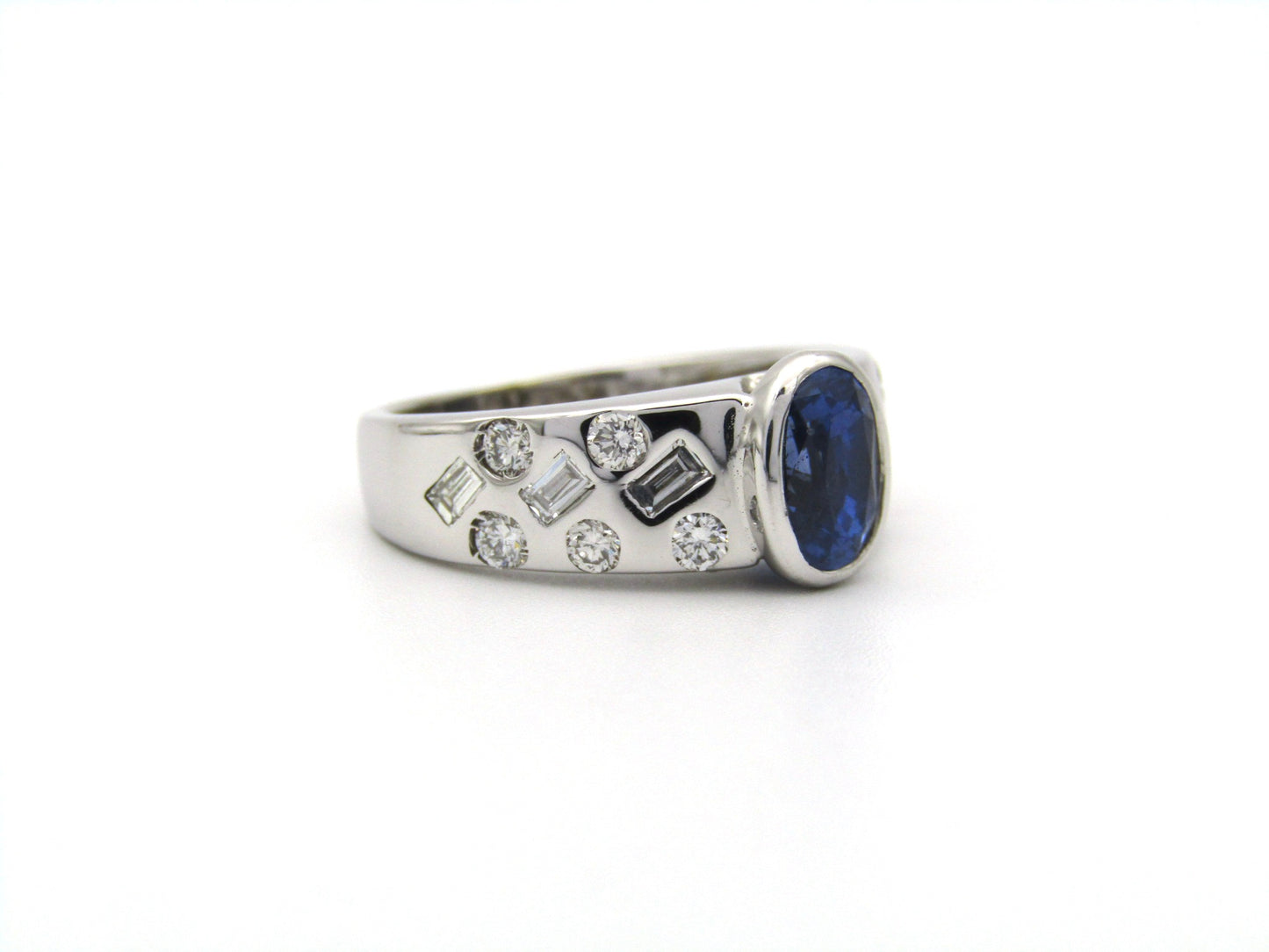 18K gold sapphire and diamond ring.