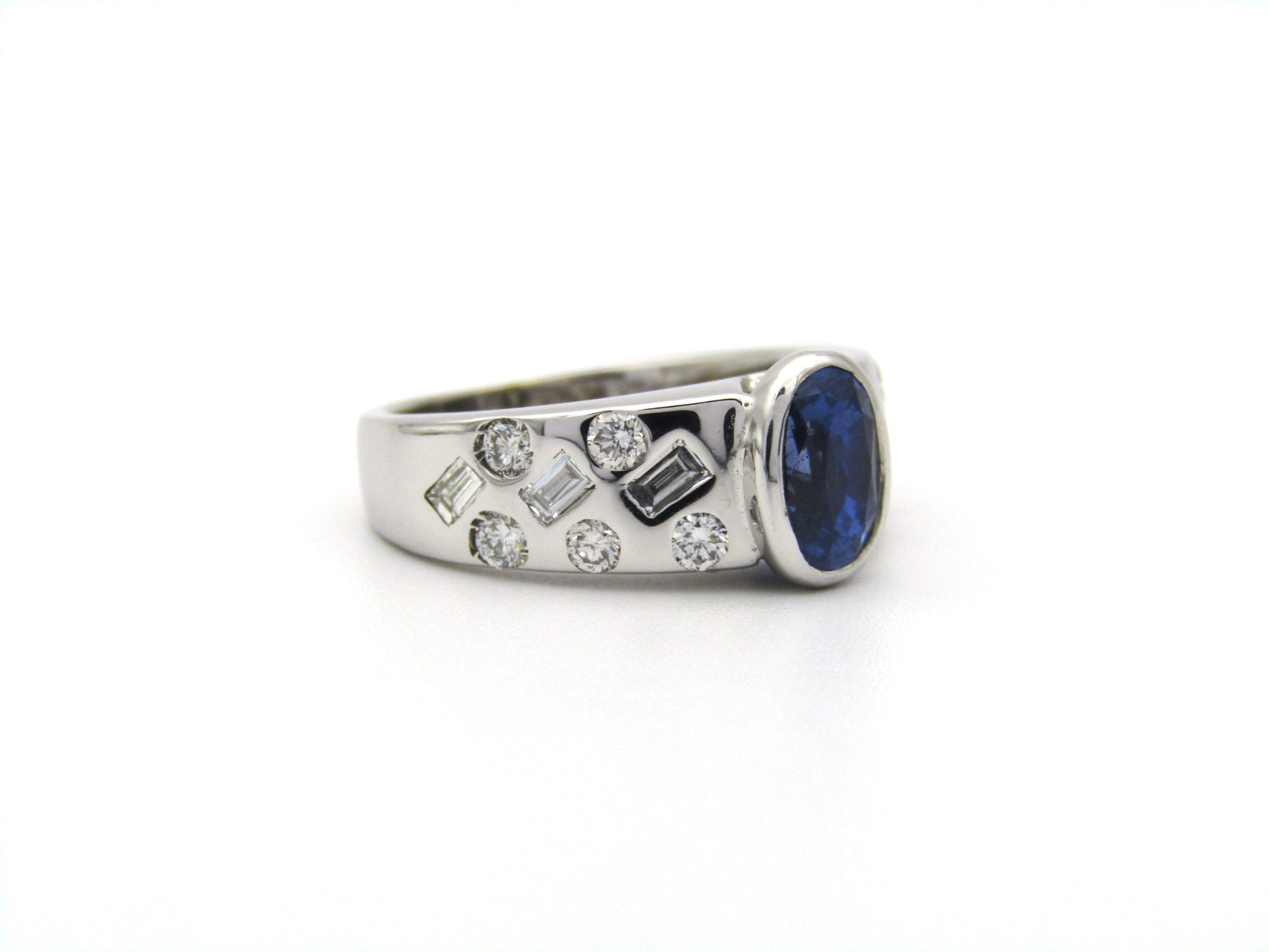 18K gold sapphire and diamond ring.