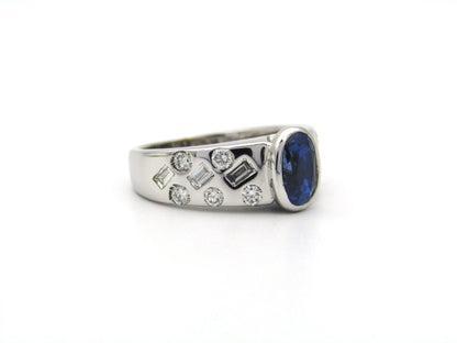18K gold sapphire and diamond ring.