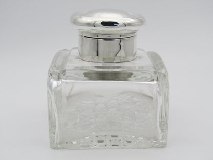 A silver mounted and cut glass desk inkwell by Asprey & Co. Ltd, Birmingham, 1915.
