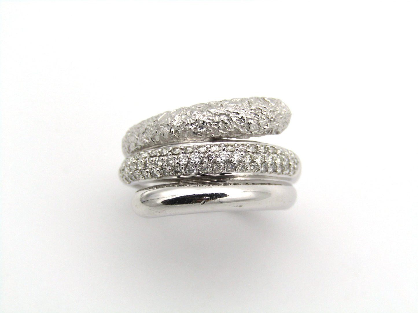 9K gold diamond twist ring.