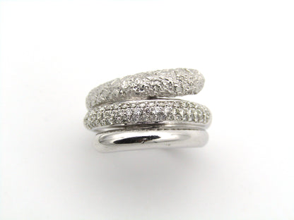 9K gold diamond twist ring.