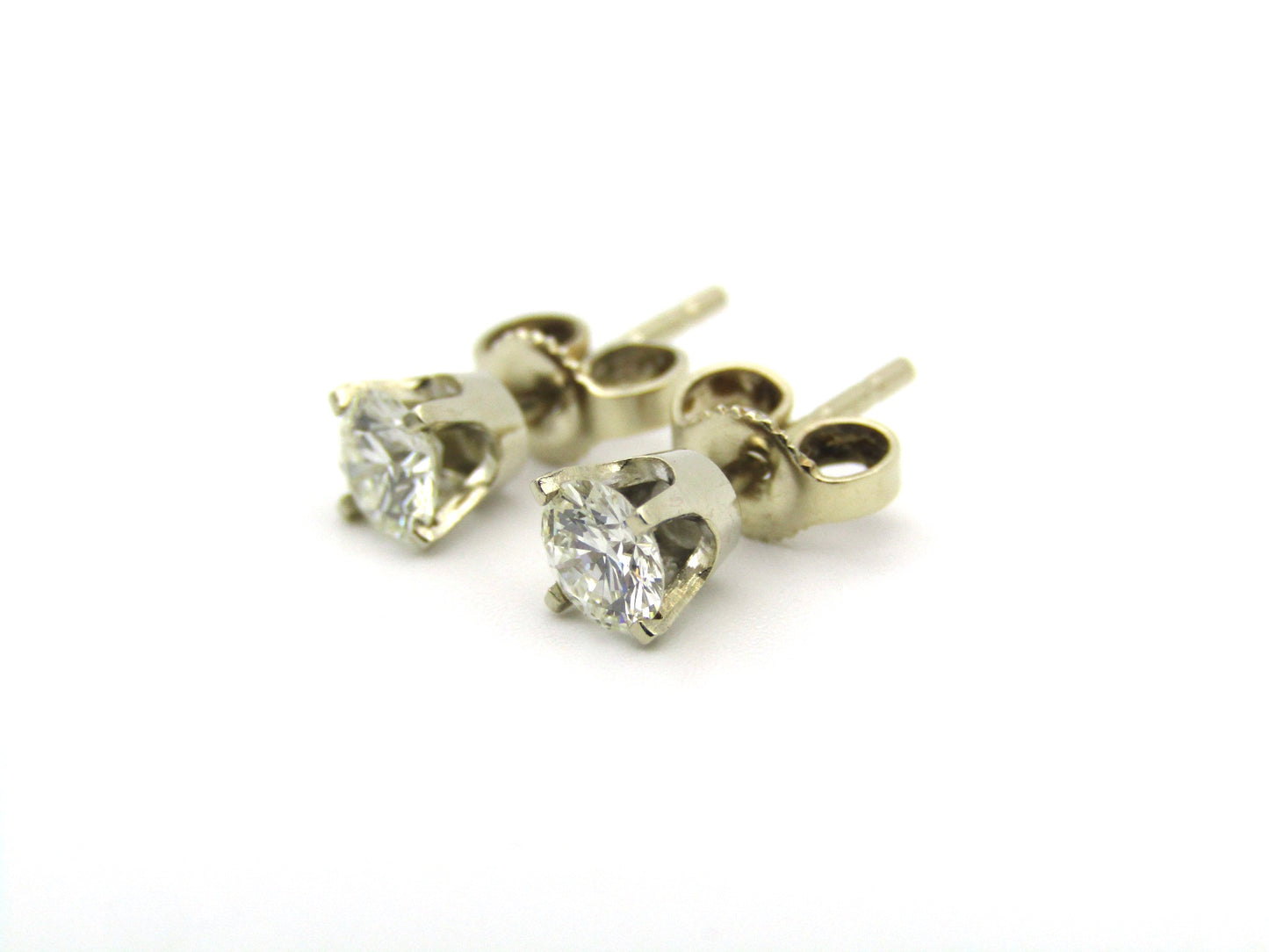 14K gold diamond studs.