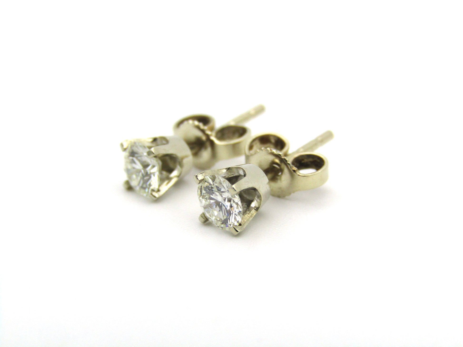 14K gold diamond studs.