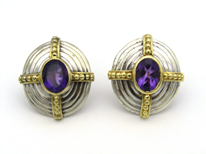 A pair of 18kt and 9kt gold amethyst earrings.
