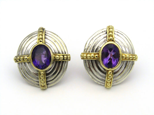A pair of 18kt and 9kt gold amethyst earrings.