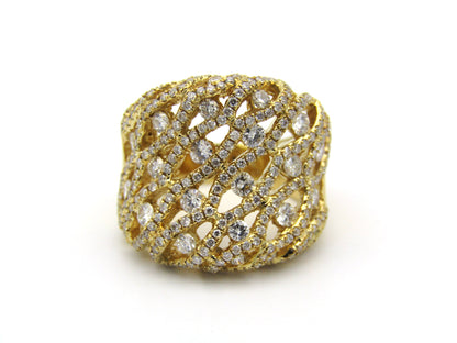 18K gold diamond dress ring.