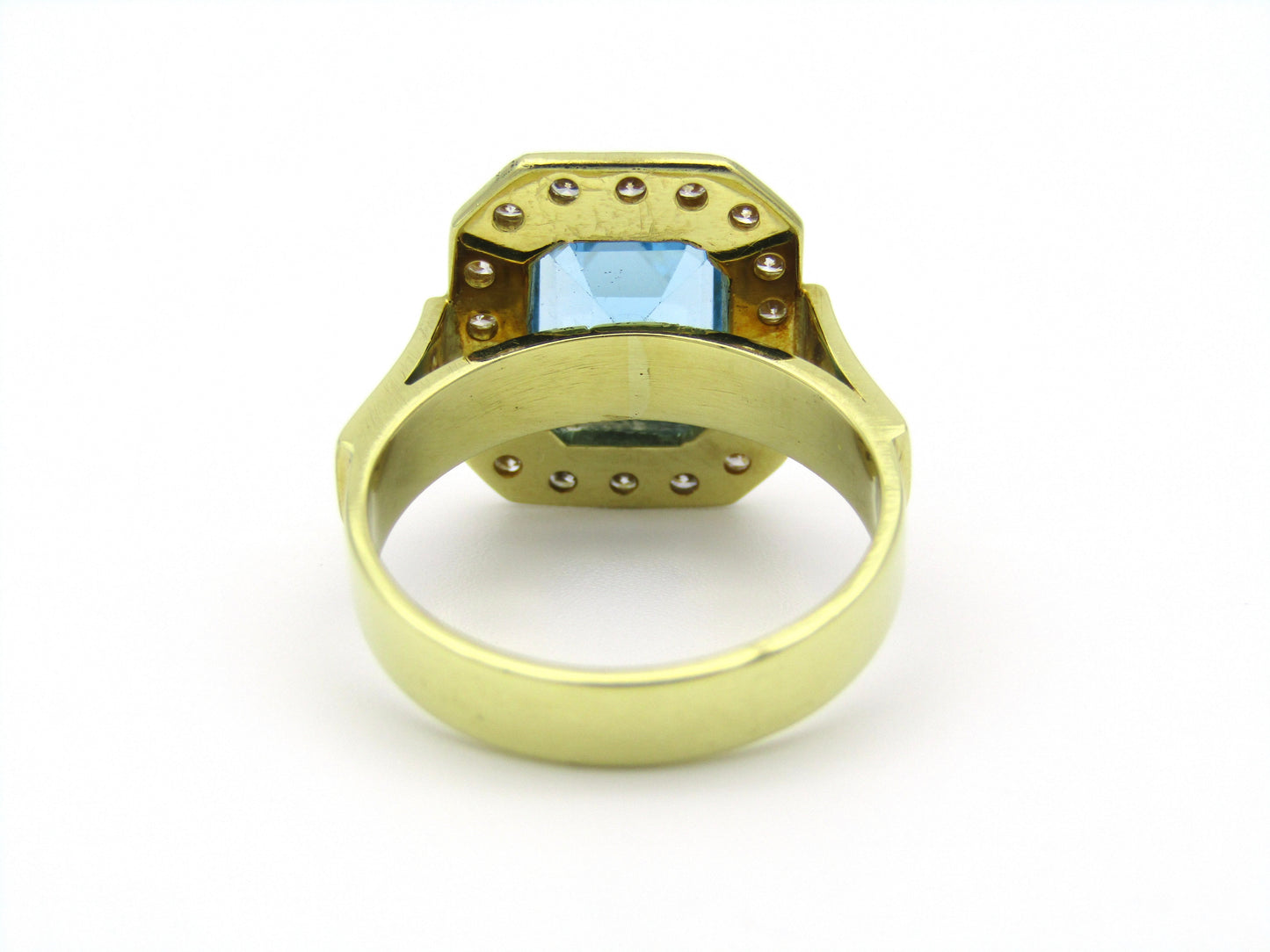 18kt yellow gold blue topaz and diamond ring.