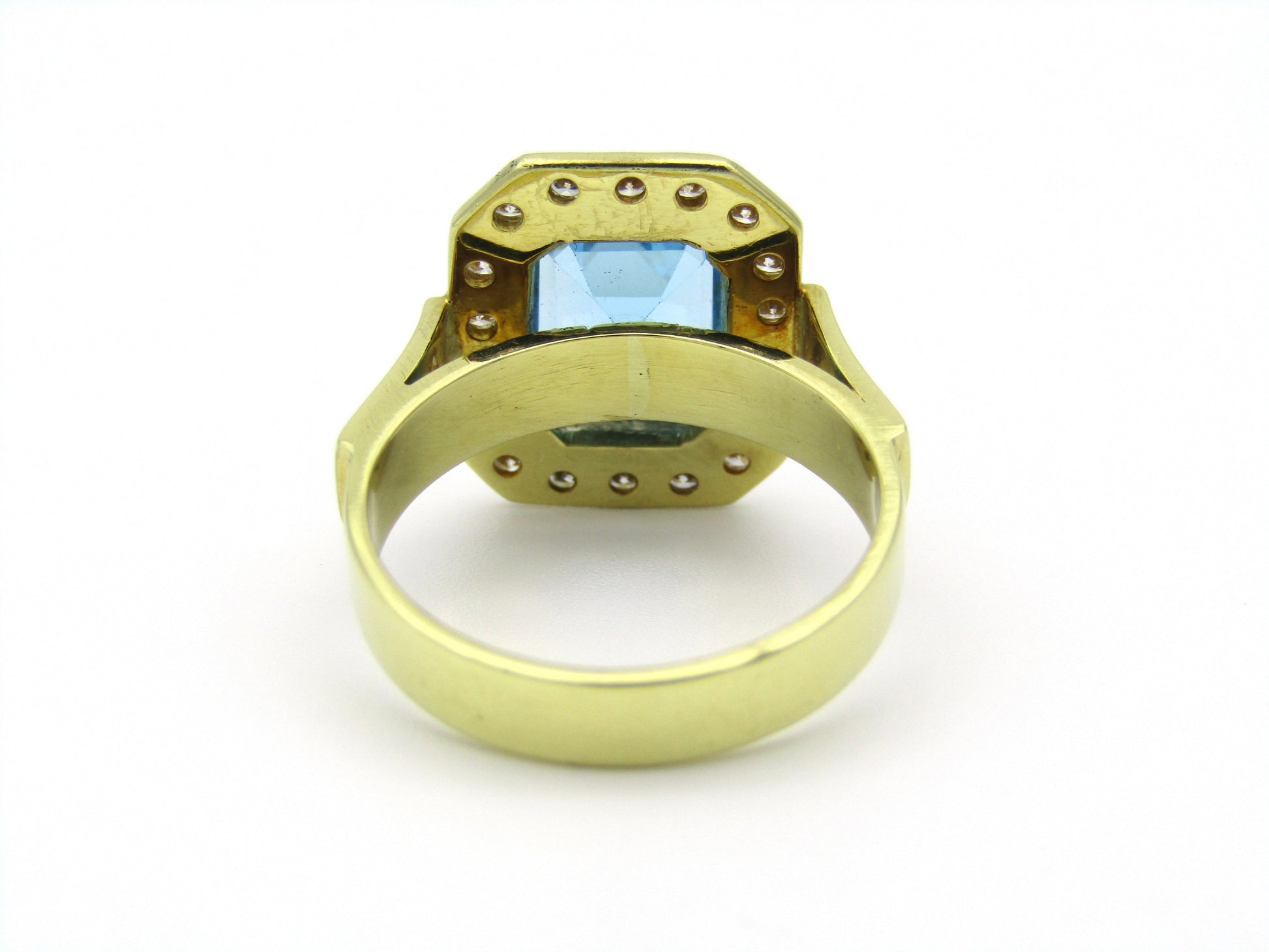18kt yellow gold blue topaz and diamond ring.