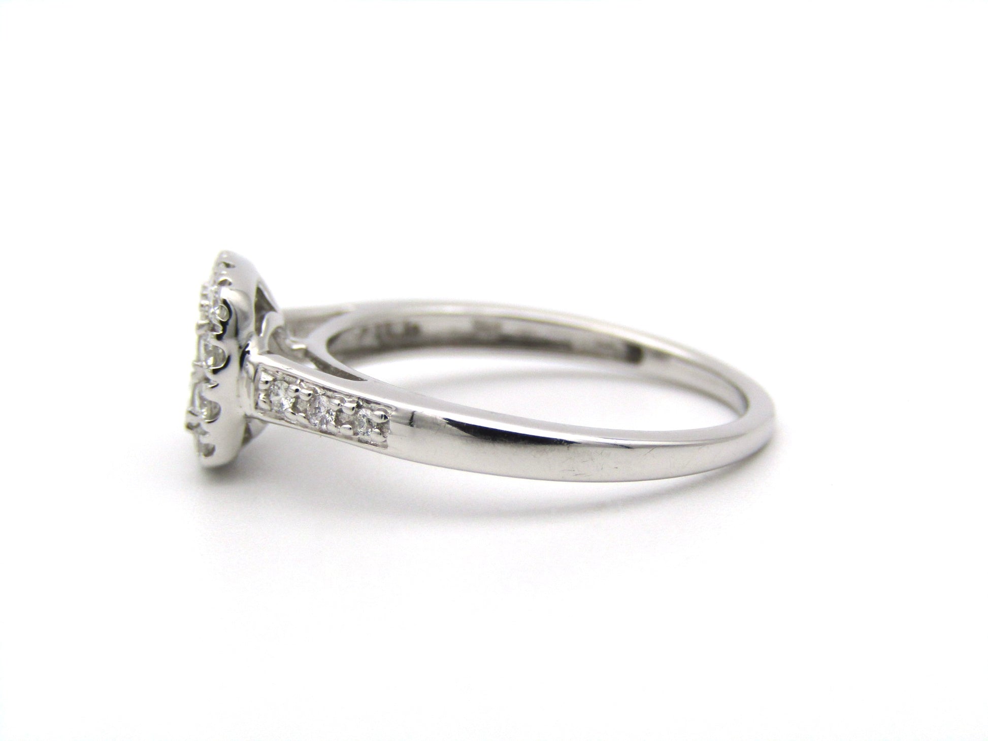 9K gold diamond ring.