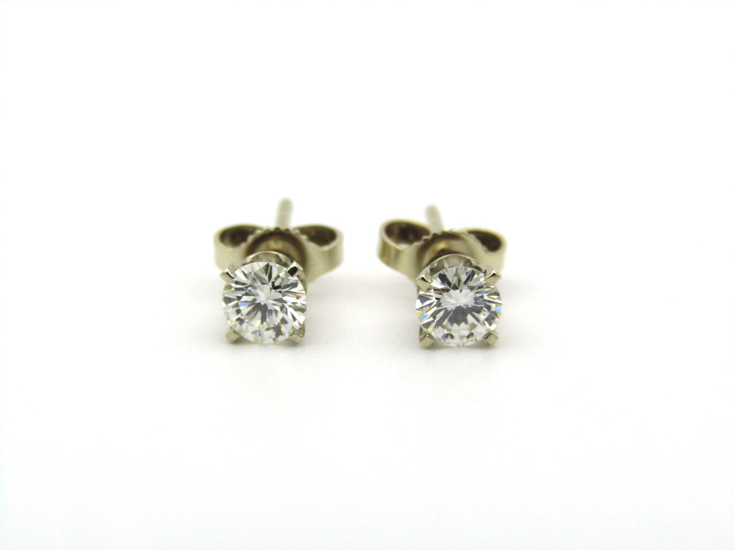 14K gold diamond studs.
