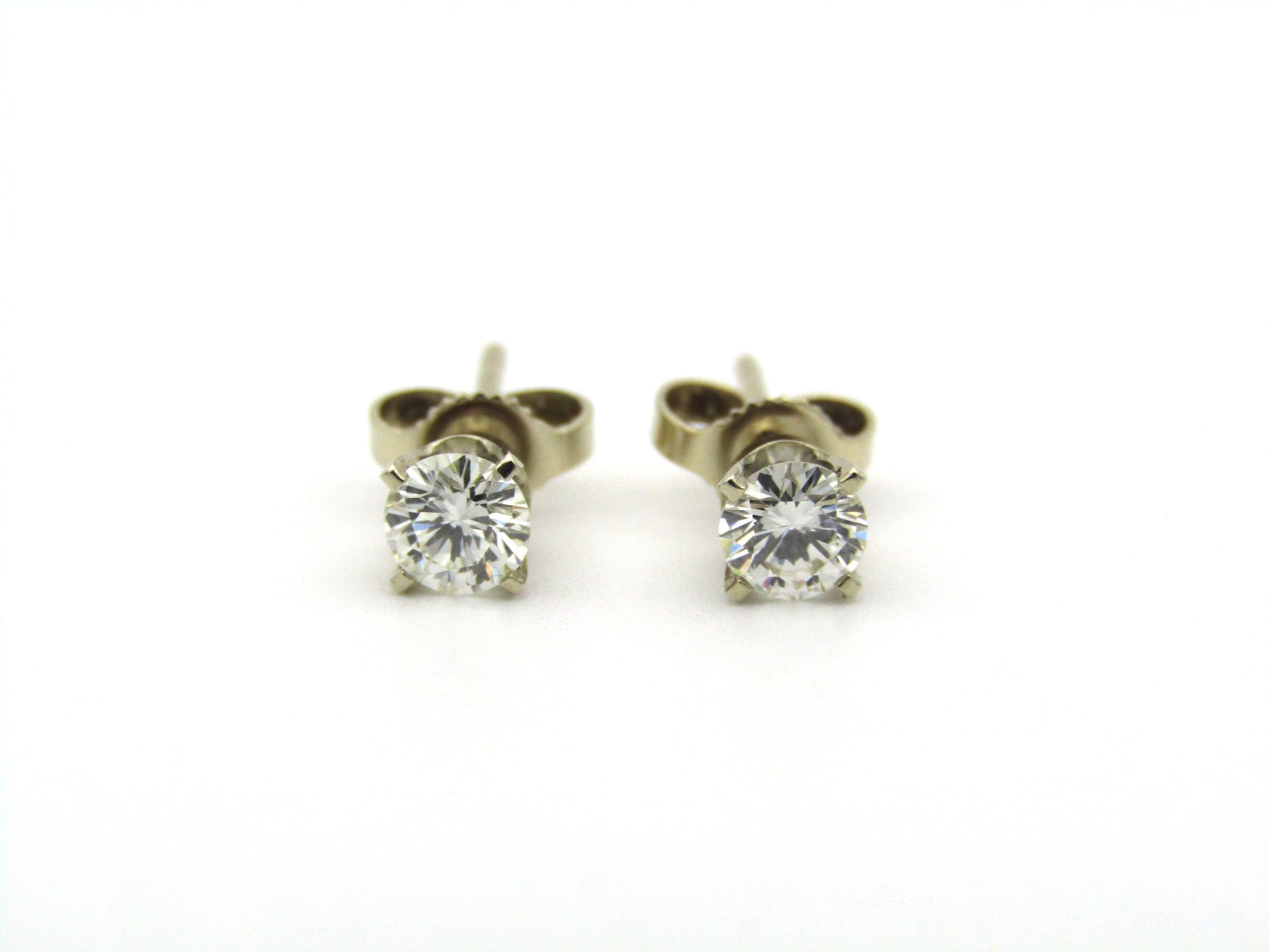 14K gold diamond studs.