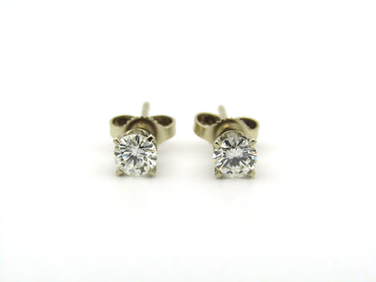 14K gold diamond studs.