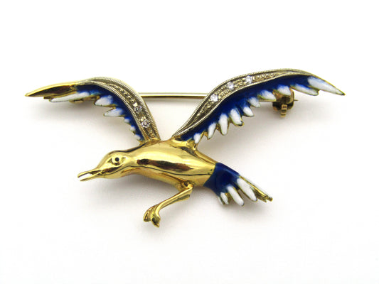 18kt gold diamond and enamel "Bird in flight" brooch.