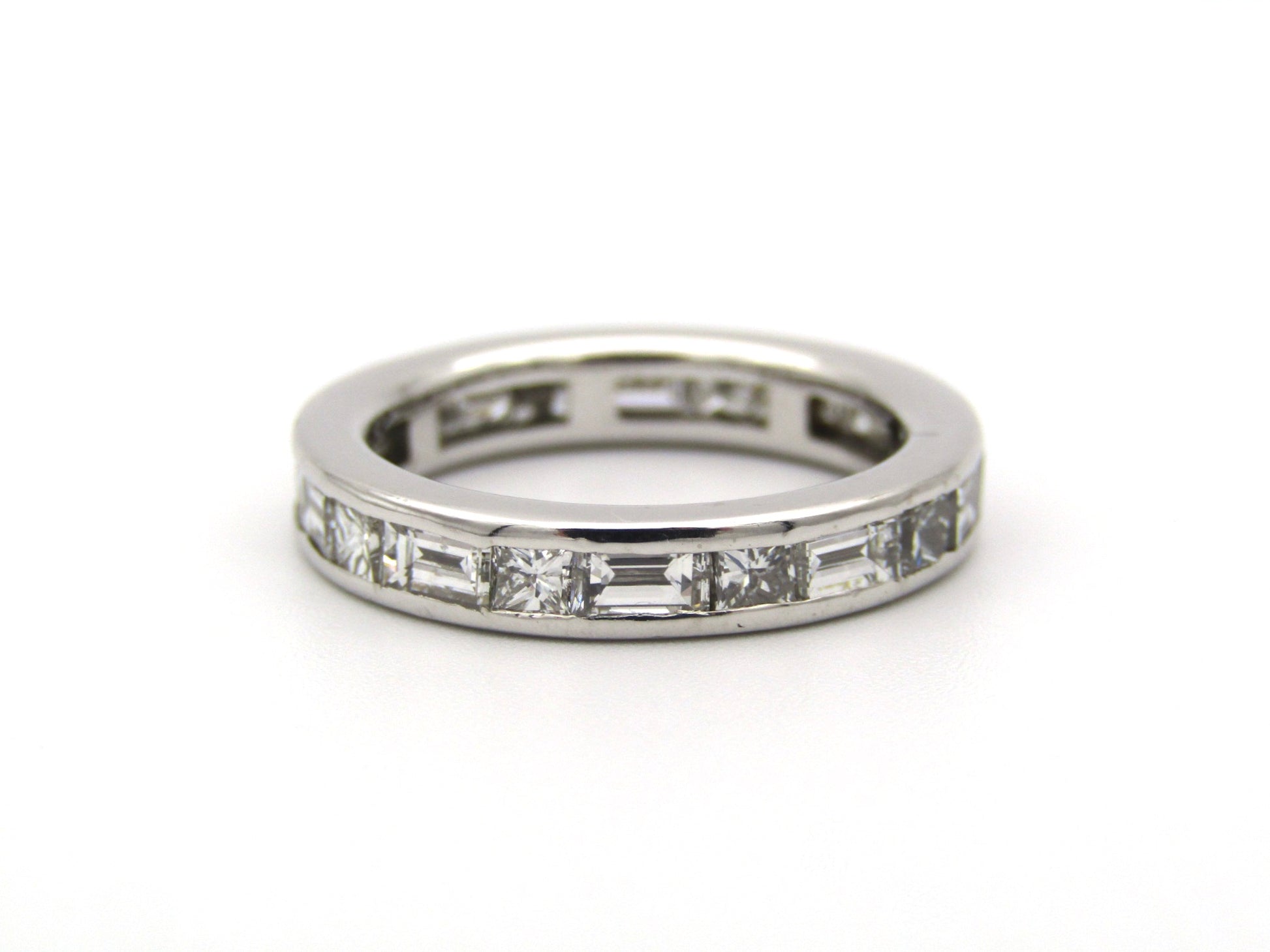 18K gold diamond eternity ring.
