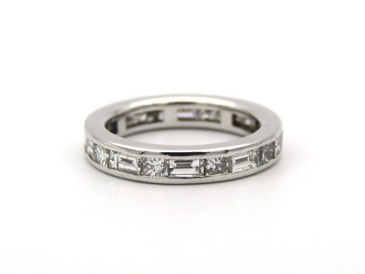 18K gold diamond eternity ring.