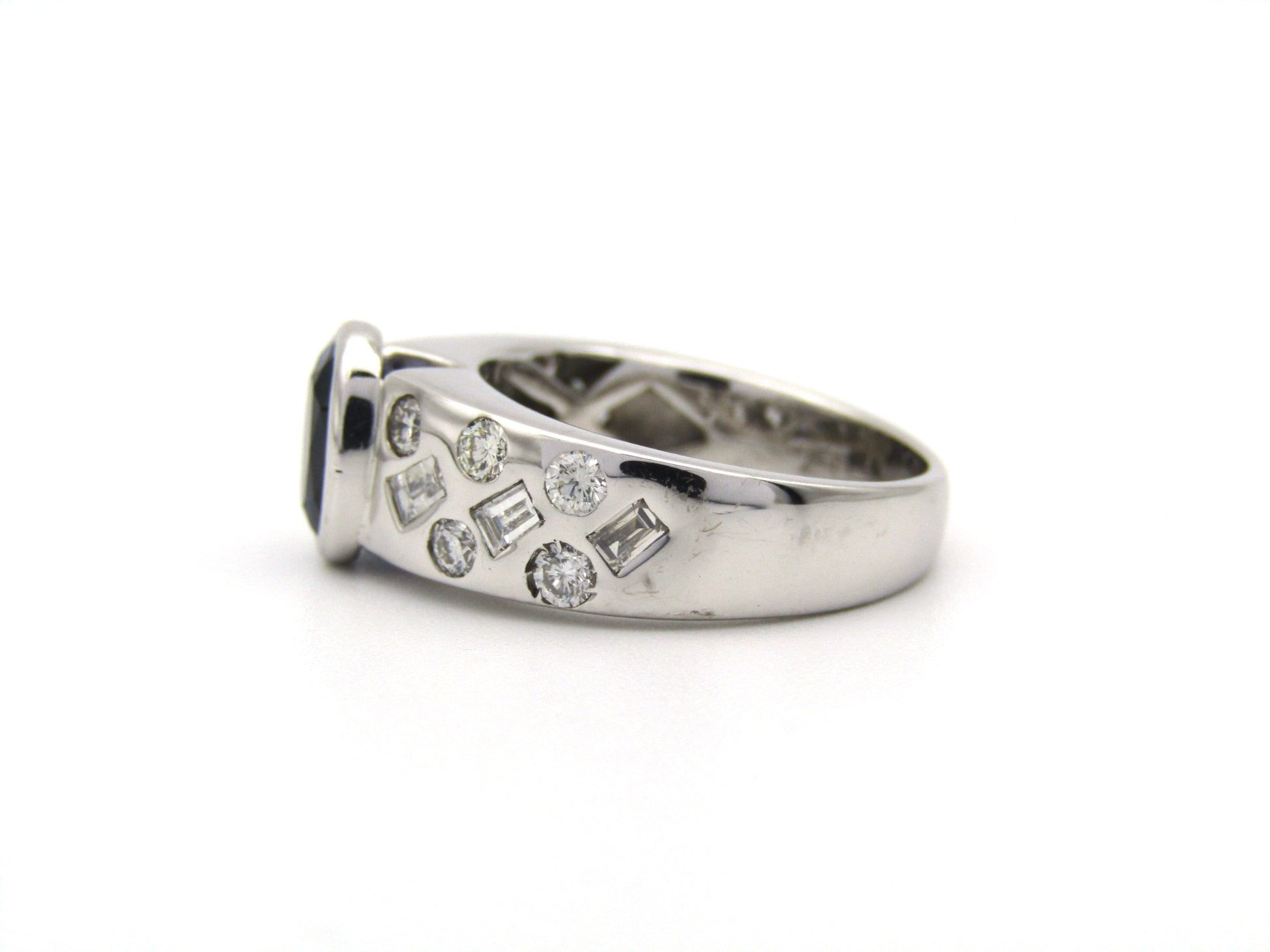 18K gold sapphire and diamond ring.