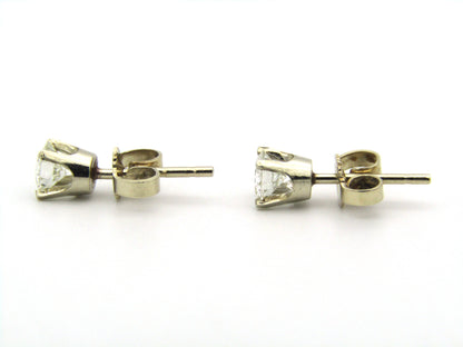 14K gold diamond studs.