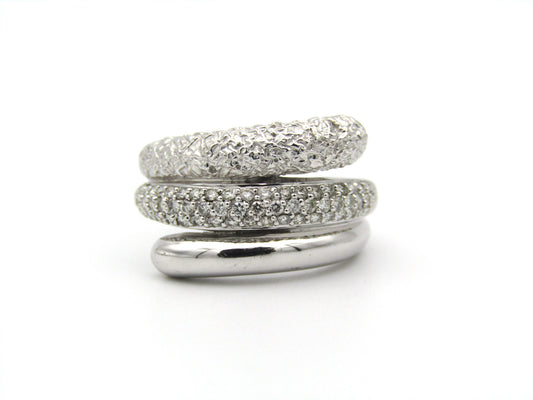 9K gold diamond swirl ring.