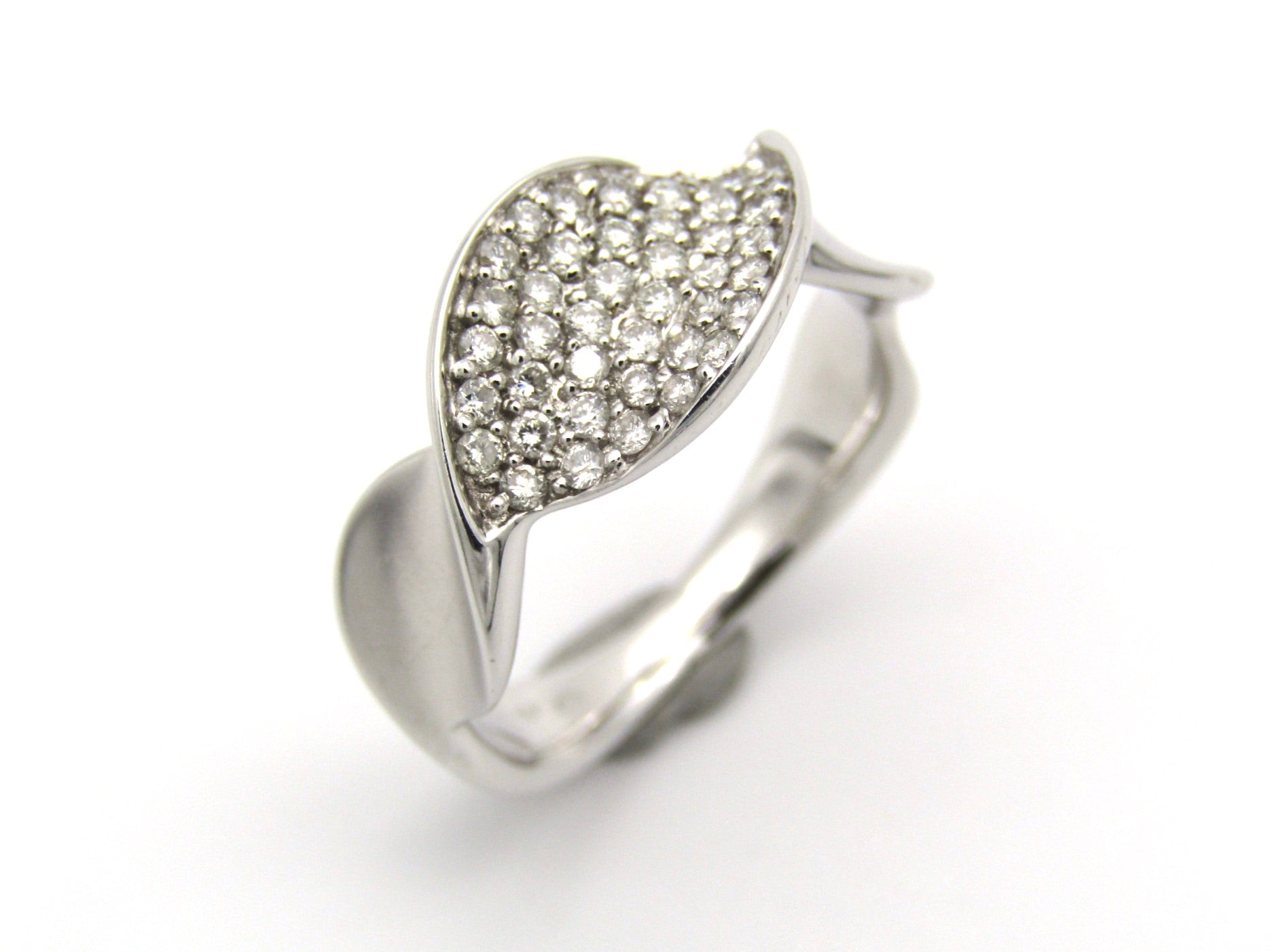 18K gold twist diamond ring.