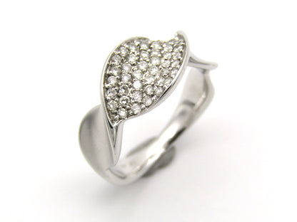 18K gold twist diamond ring.