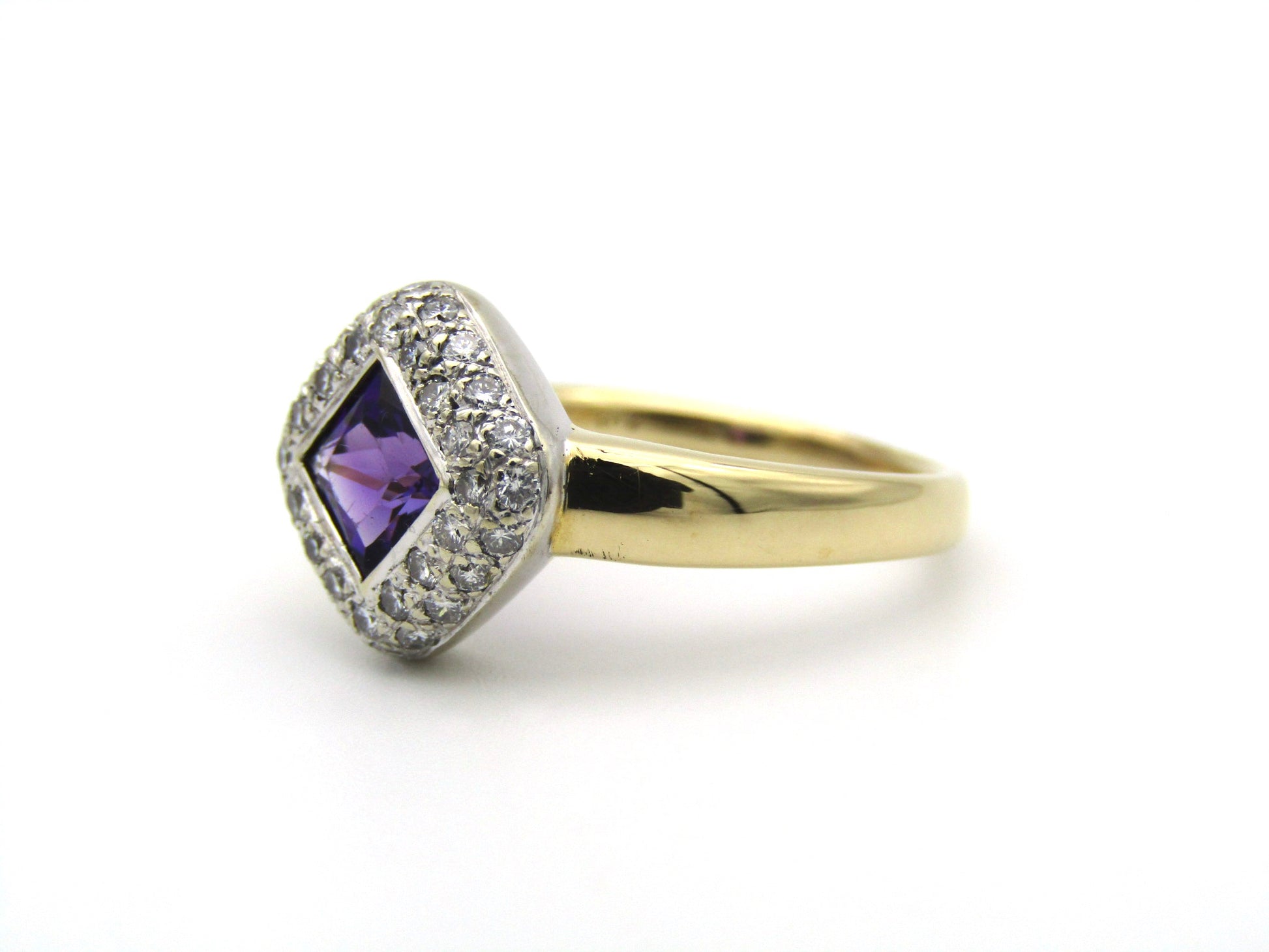18K gold amethyst and diamond ring.