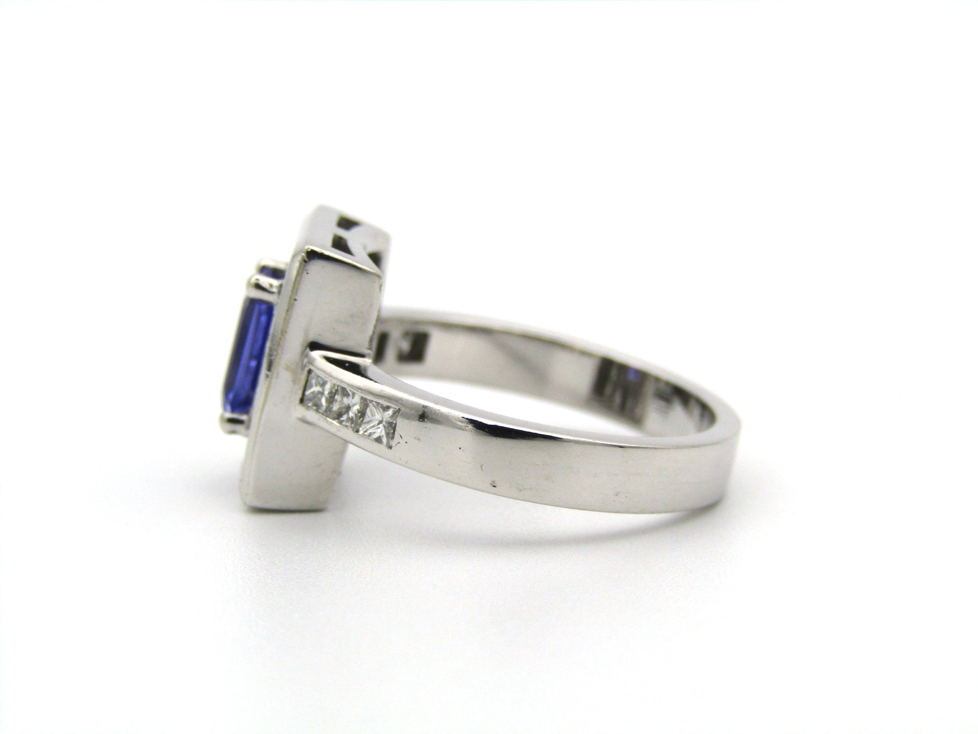 18K gold tanzanite and diamond ring.