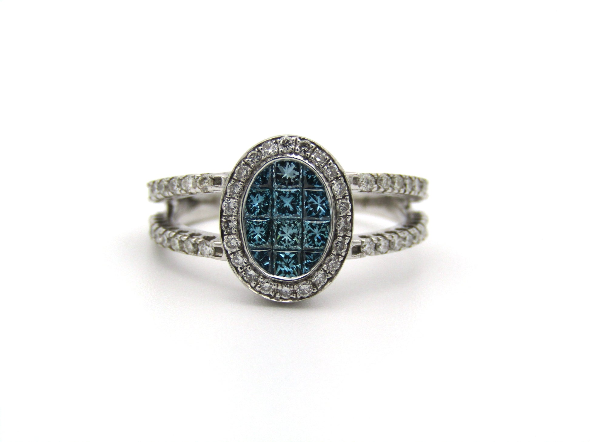 18K gold blue and colourless diamond ring.