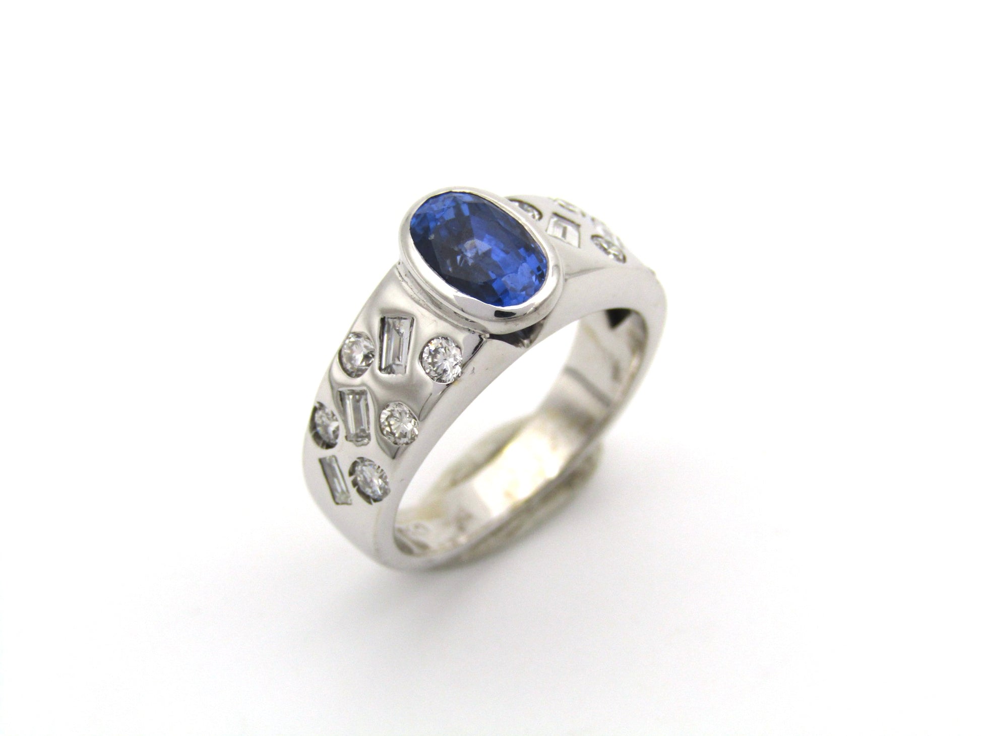 18K gold sapphire and diamond ring.