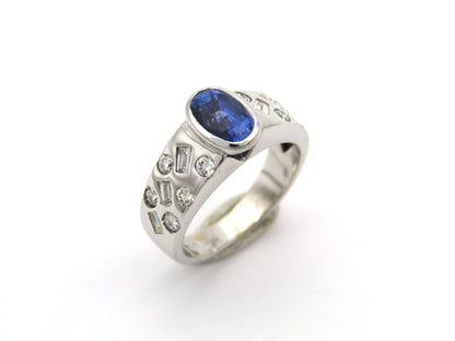 18K gold sapphire and diamond ring.
