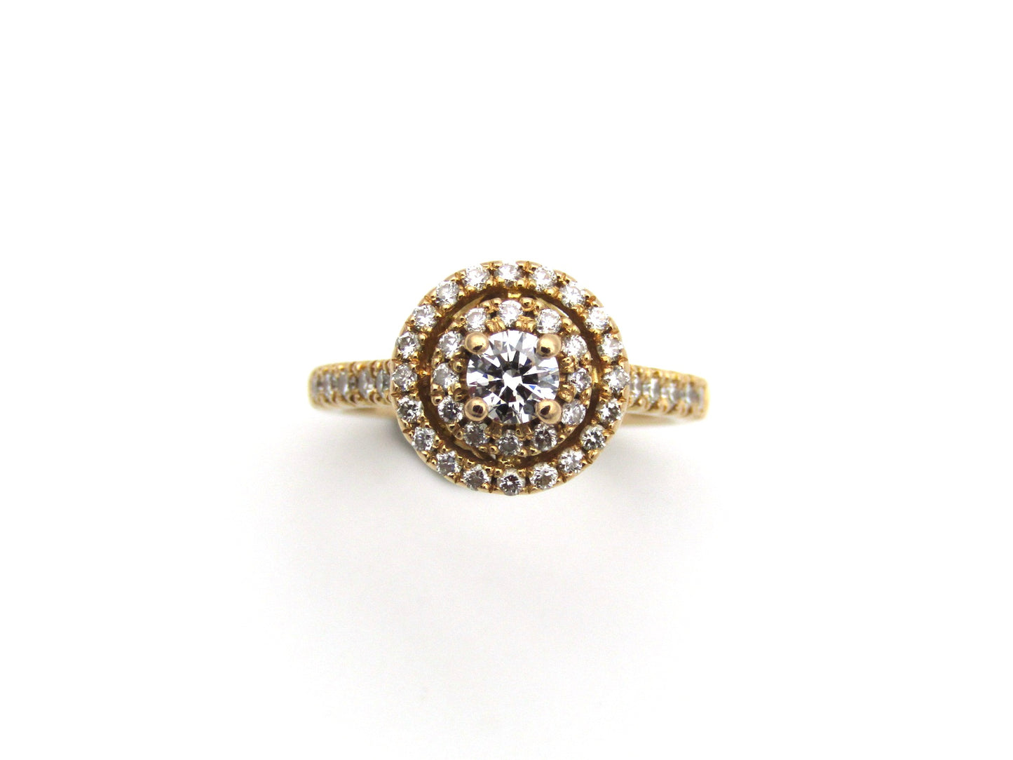 18K gold diamond halo ring.