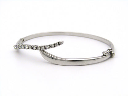 18K white gold diamond bangle.