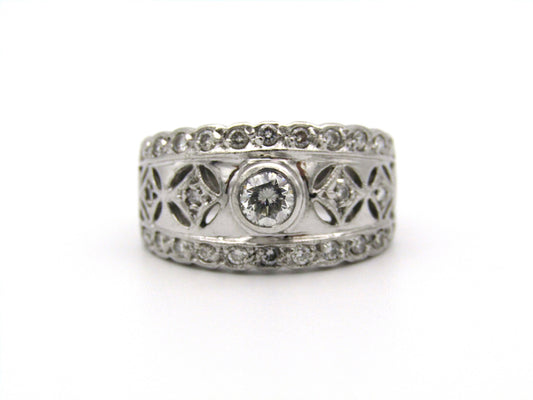 18kt gold diamond ring by Jenna Clifford.