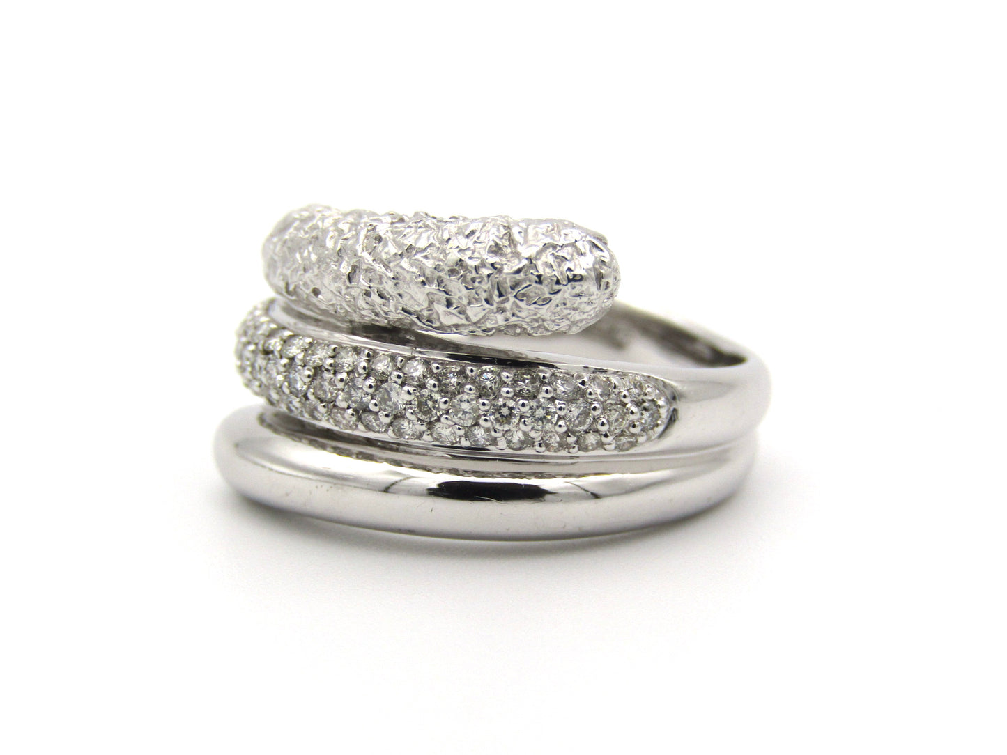 9K gold diamond twist ring.
