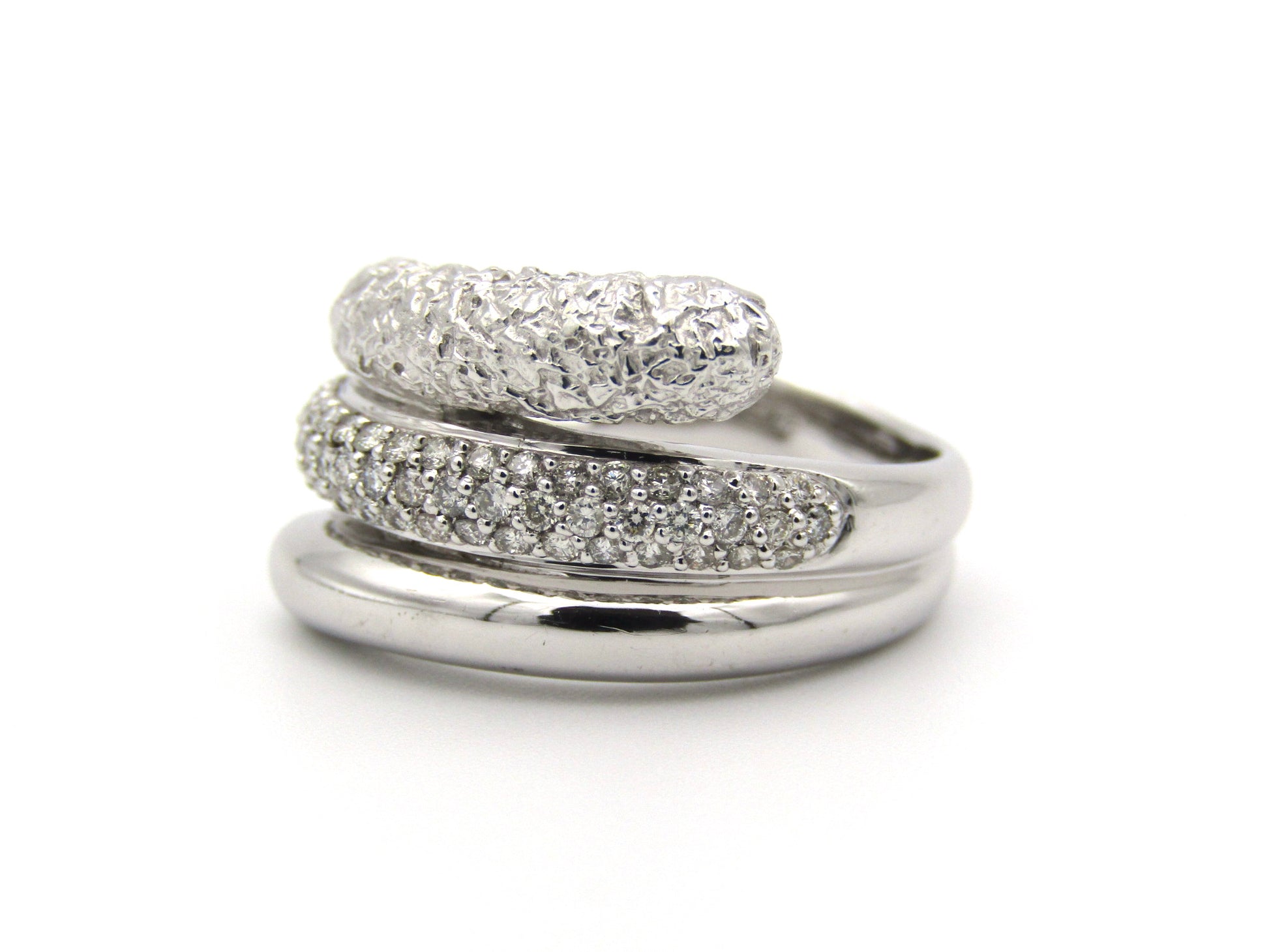 9K gold diamond twist ring.