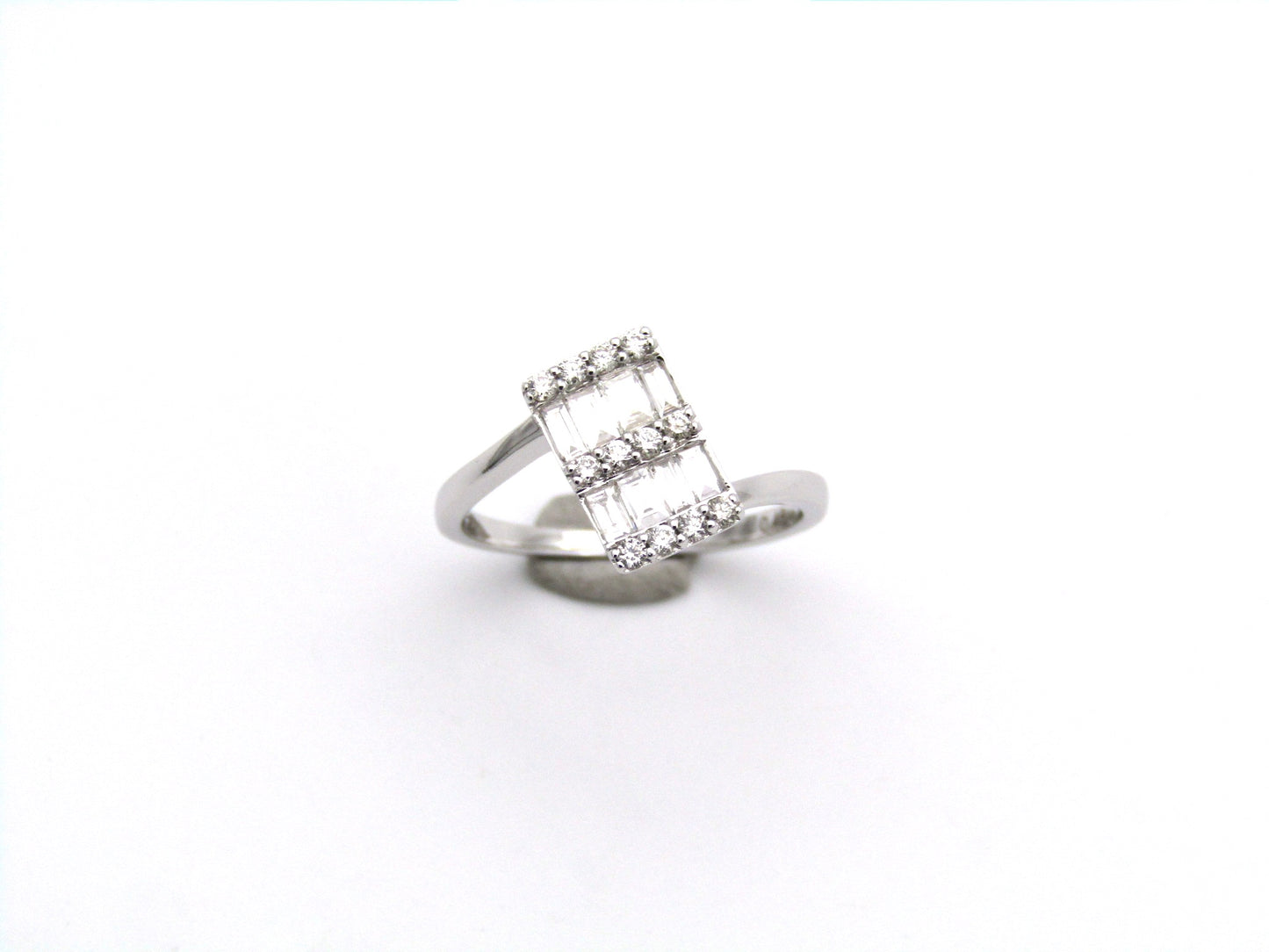 18K gold diamond ring.