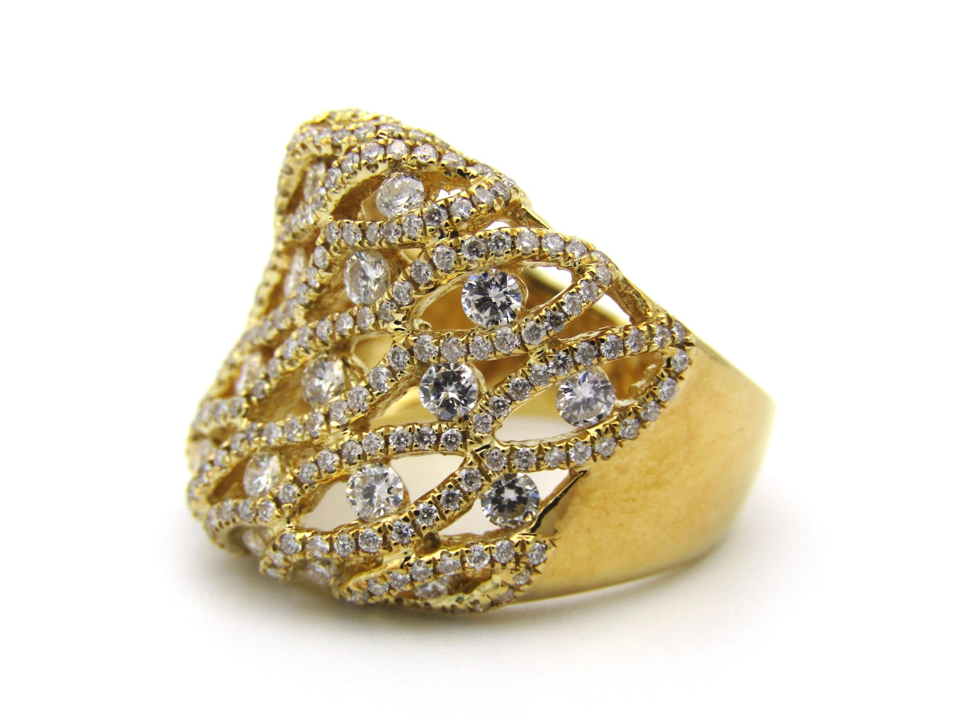 18K gold diamond dress ring.