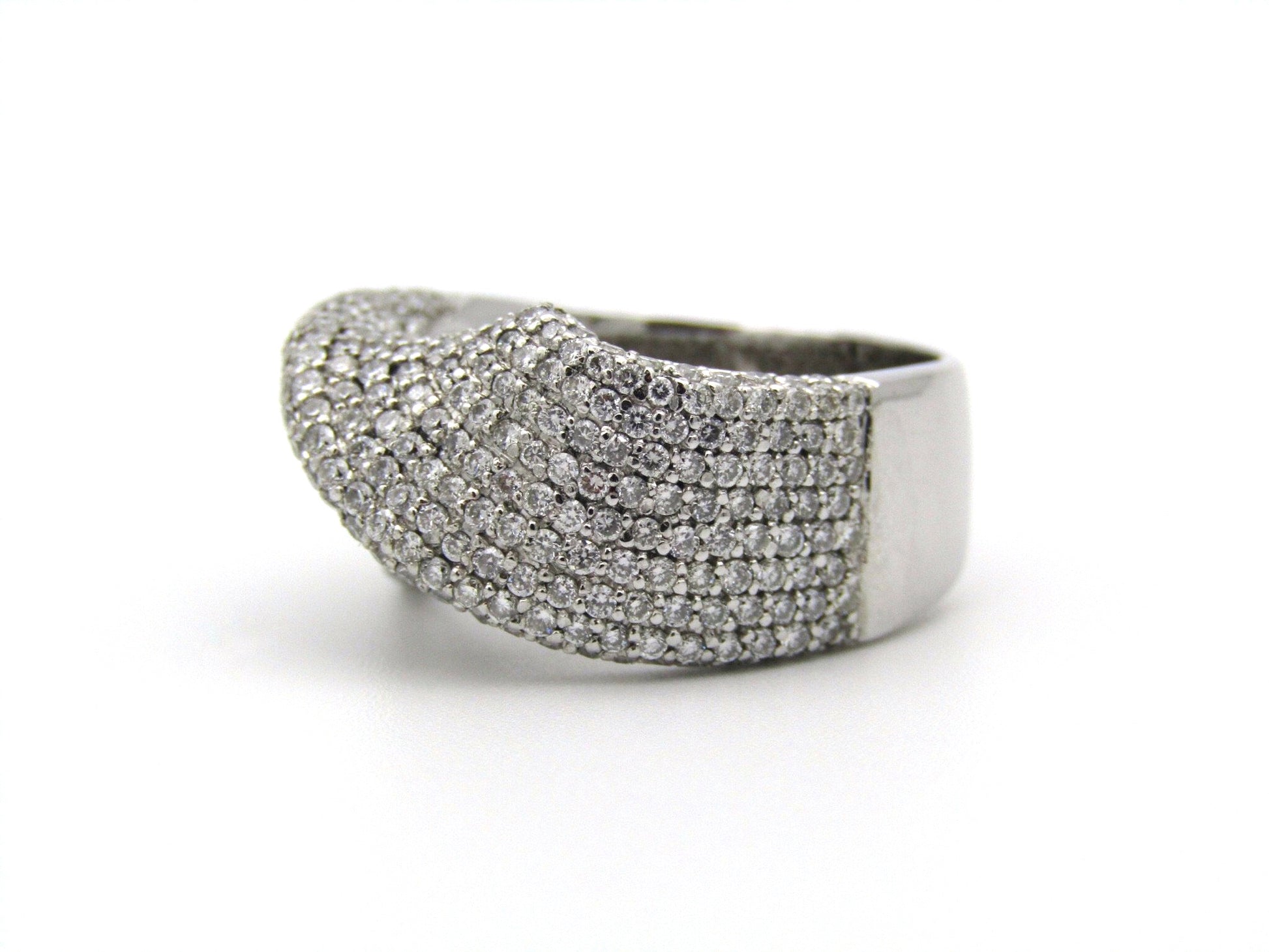 18K white gold diamond twist ring.