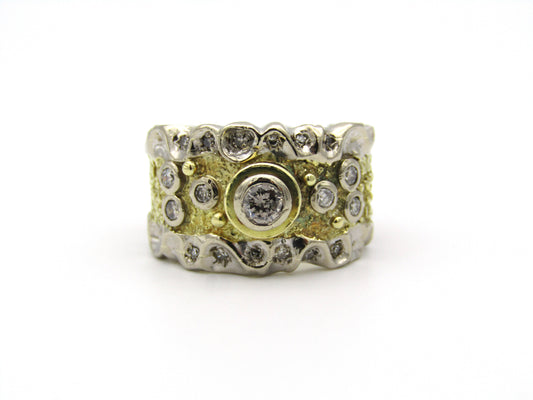 18kt gold diamond ring.