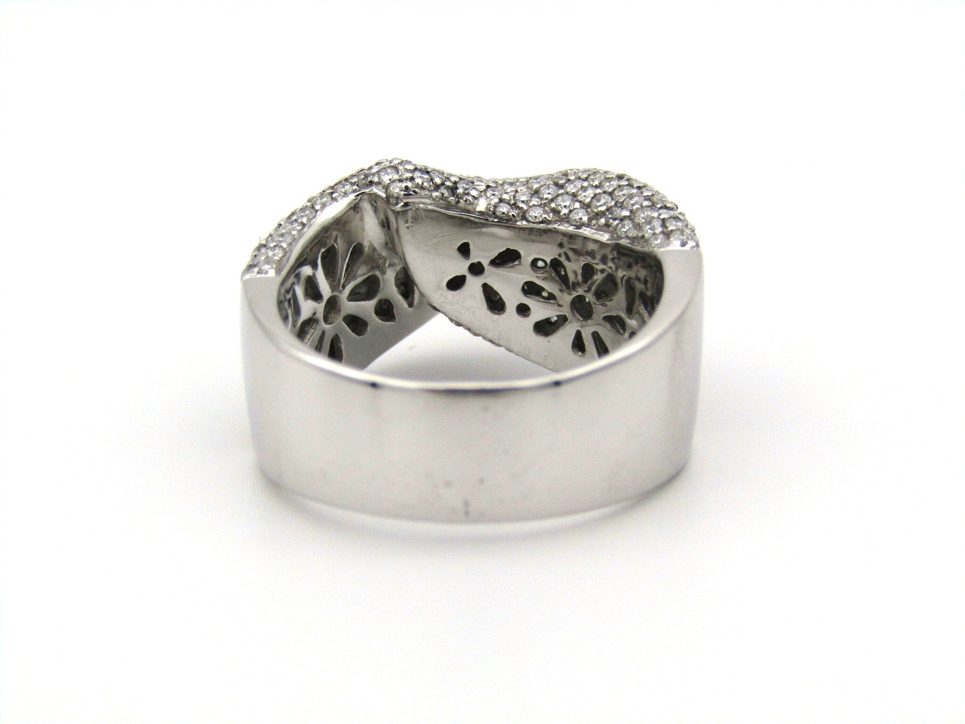 18K white gold diamond twist ring.