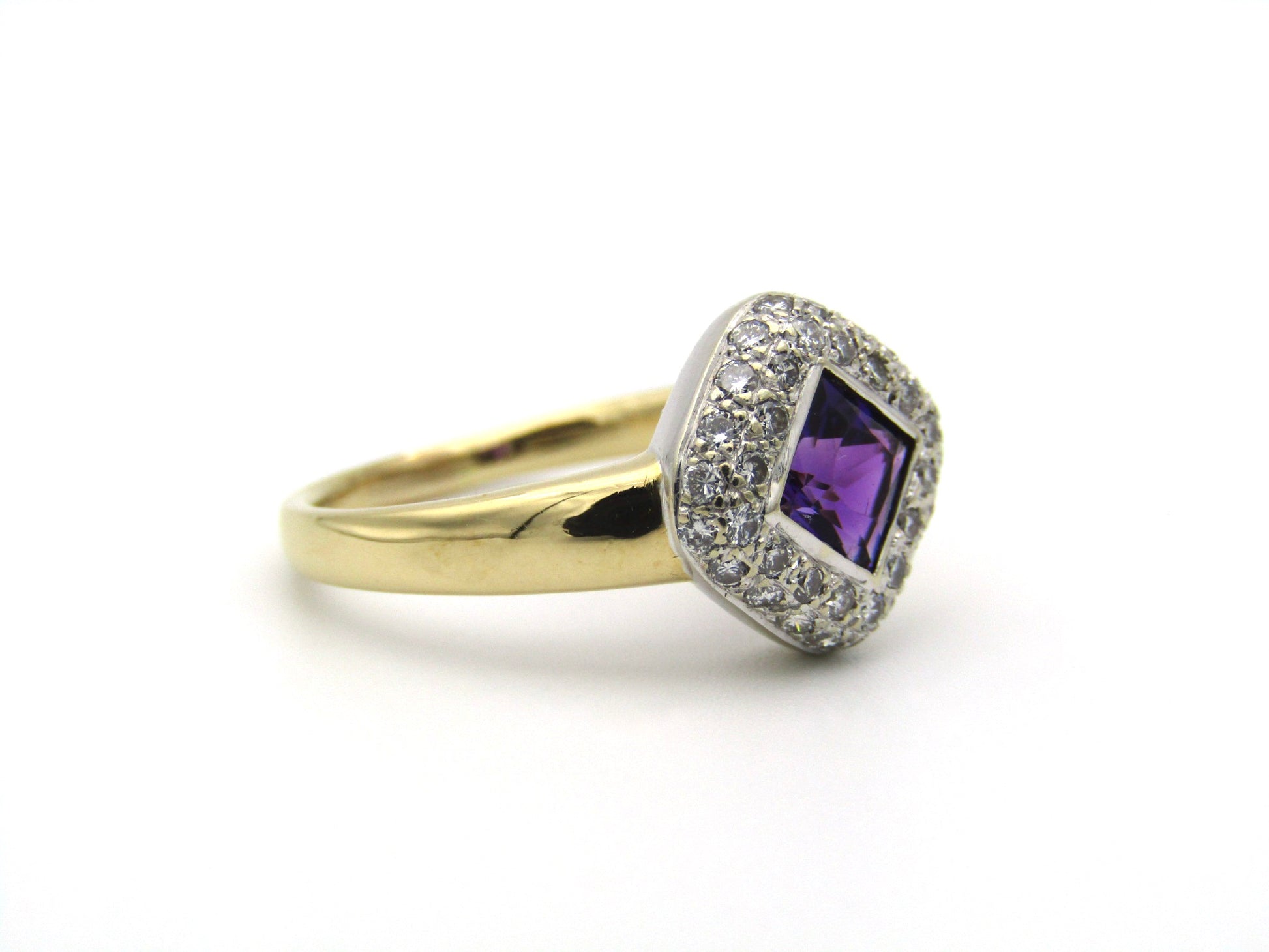 18K gold amethyst and diamond ring.