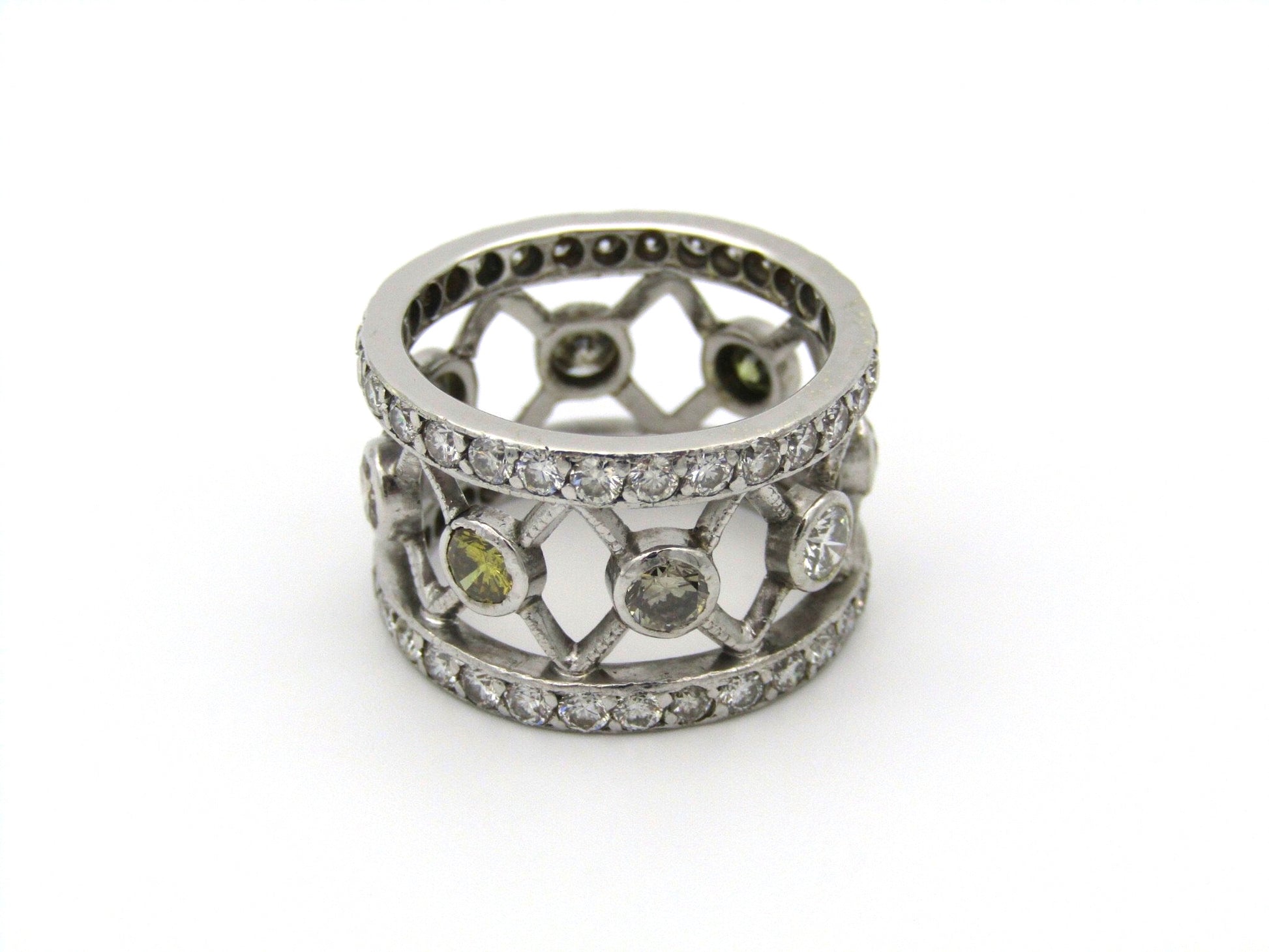 9kt gold fancy and colourless diamond ring.