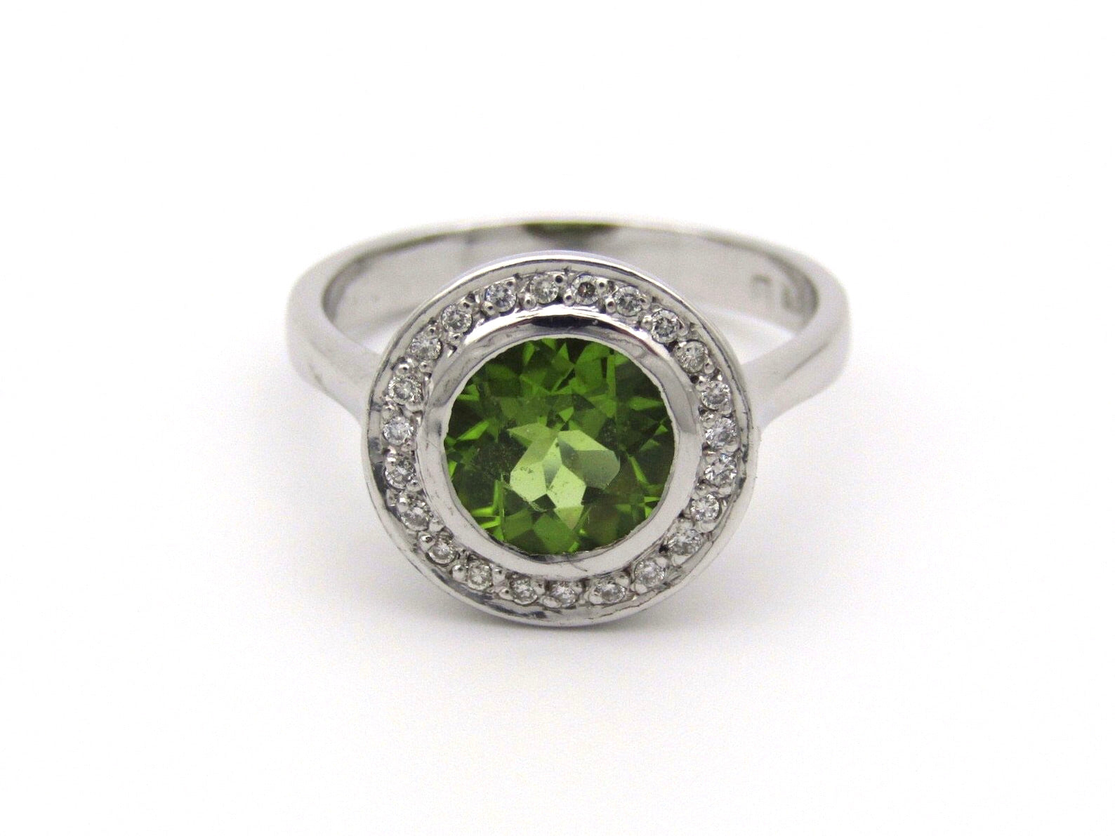 9kt gold peridot and diamond ring.
